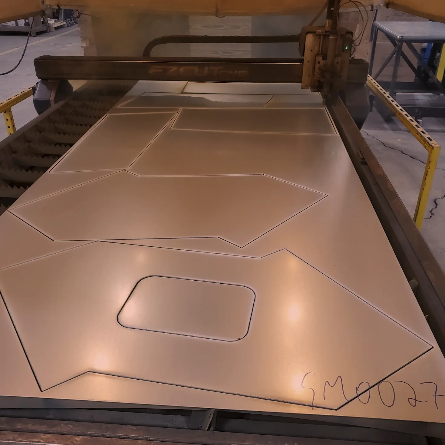 Nested parts cut from a full sheet on the CNC plasma table, contract metal fabrication at O'Donnell Metal Fab in Norristown PA