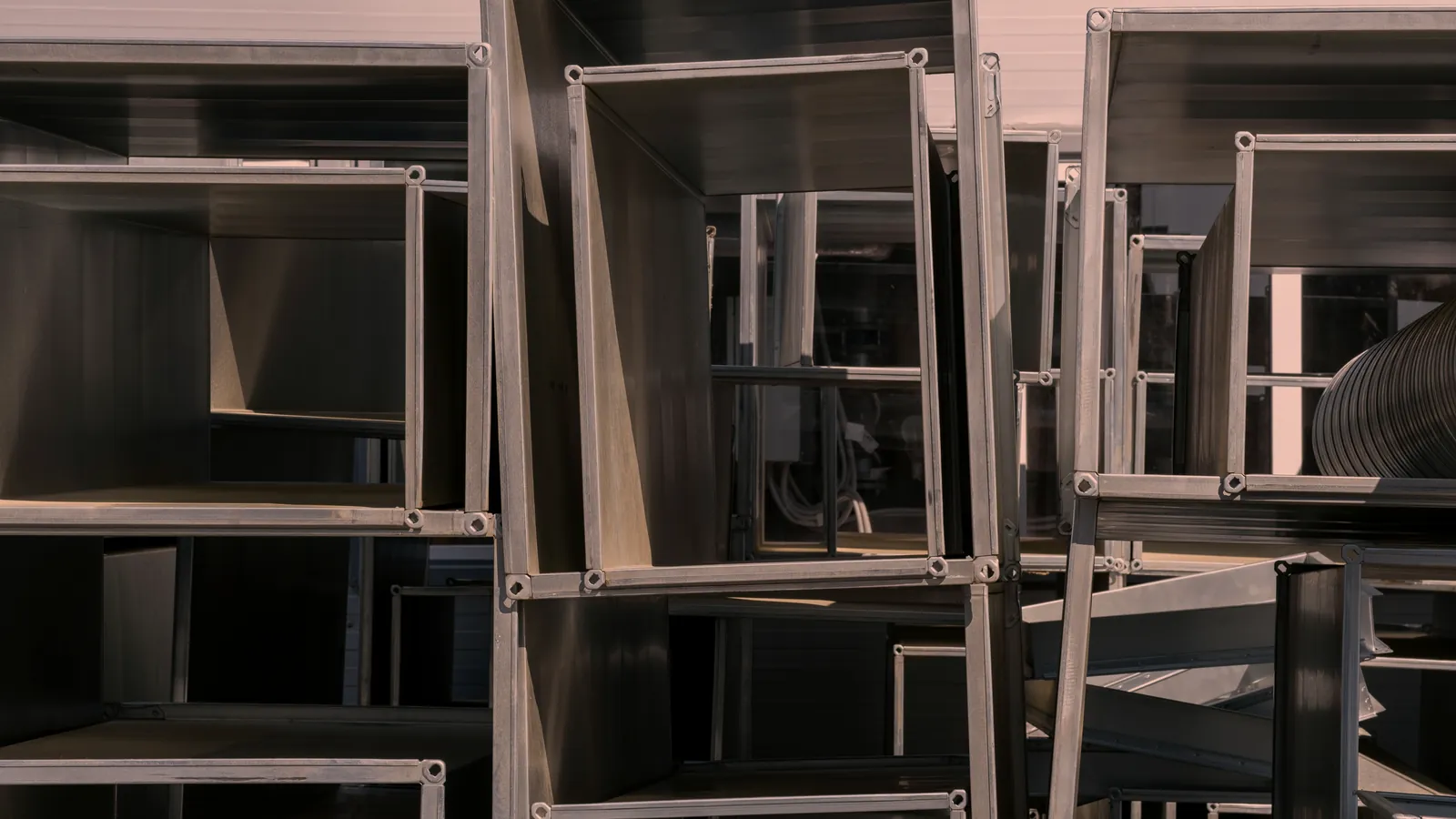 Formed aluminum sheet metal duct sections stacked and ready for delivery, custom aluminum fabrication in Norristown PA