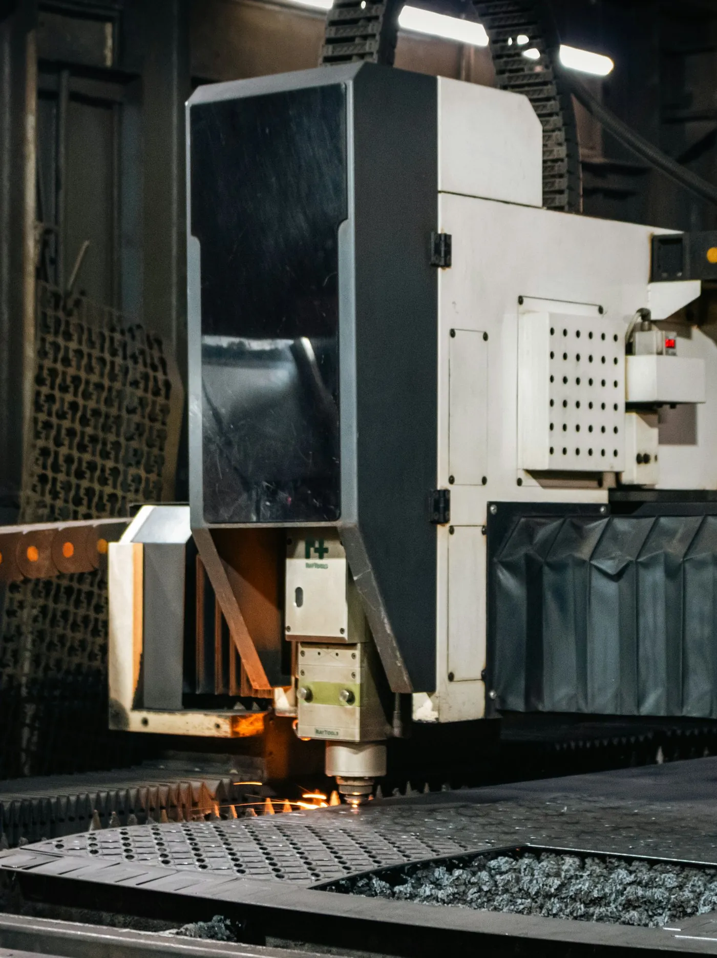 Laser tube cutter cutting steel tube, the machines behind custom metal fabrication in Norristown PA